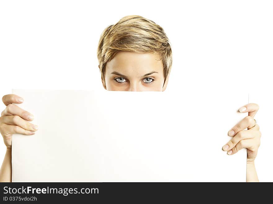 Beautiful woman holding a banner add isolated over a whtie background. Beautiful woman holding a banner add isolated over a whtie background