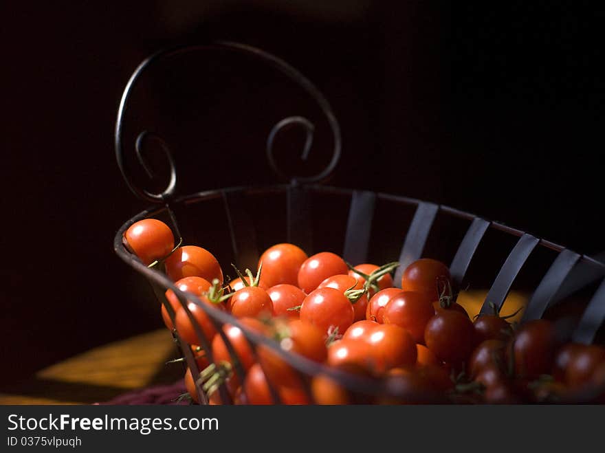 Cherry tomato basket in morning light