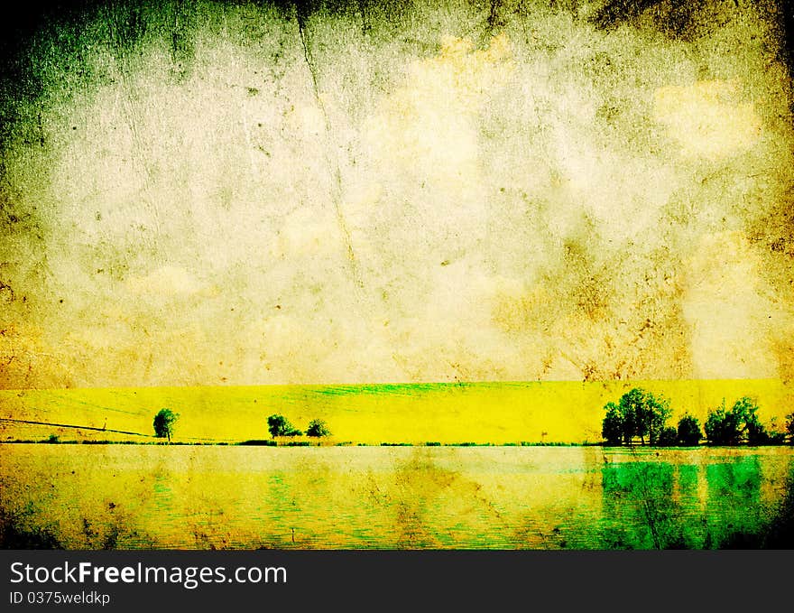 Field on a background of the blue sky. Field on a background of the blue sky