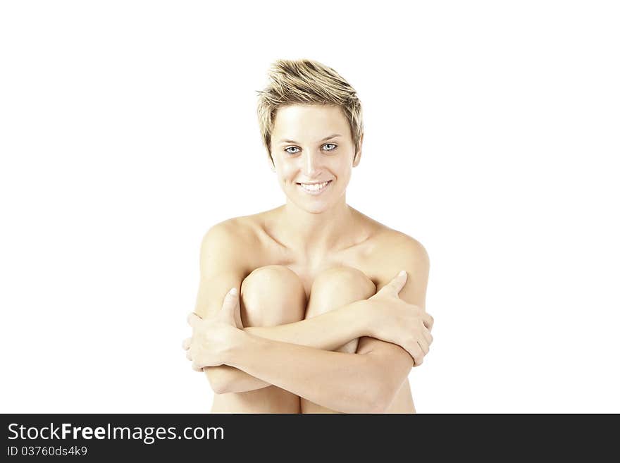 Naked blonde girl on white background