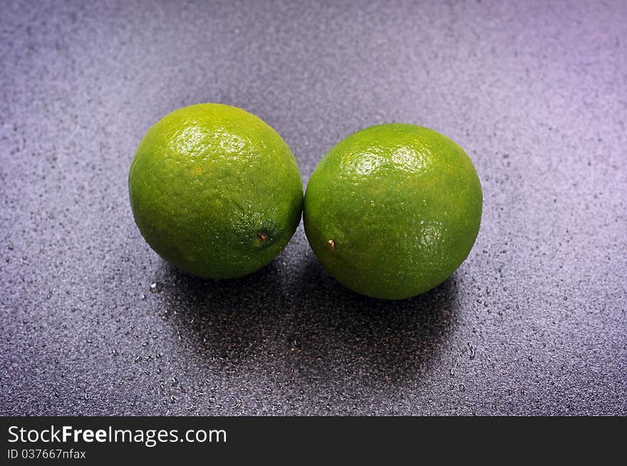 Two limes on a table