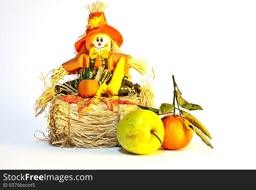 A nice halloween toy with fruits near