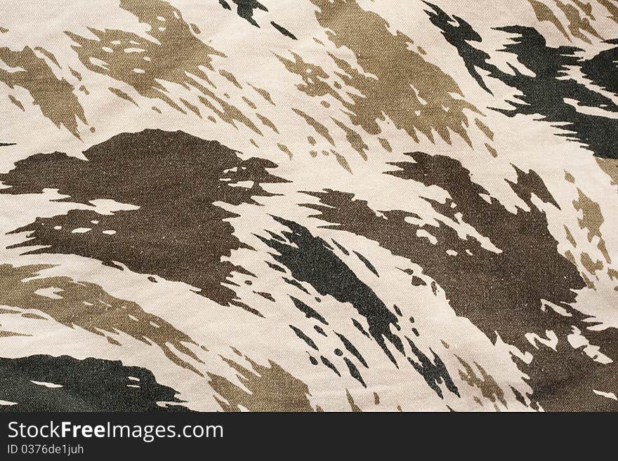 The brown camouflage pattern on cloth