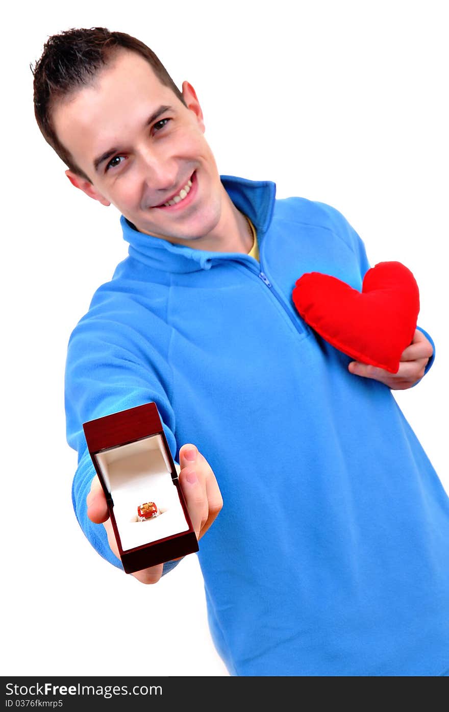 Young man holding heart