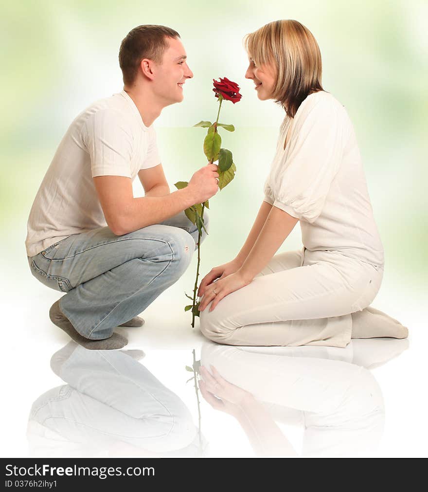 Beautiful young couple on white. Beautiful young couple on white