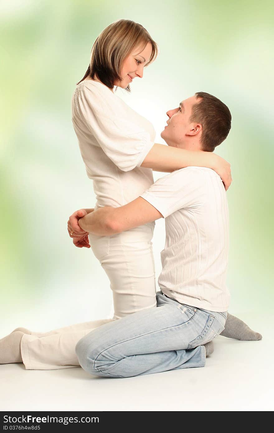 Beautiful young couple on white. Beautiful young couple on white