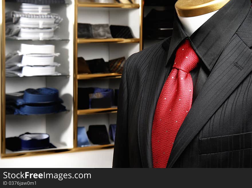 Mannequin dressed in a suit with red tie. Mannequin dressed in a suit with red tie