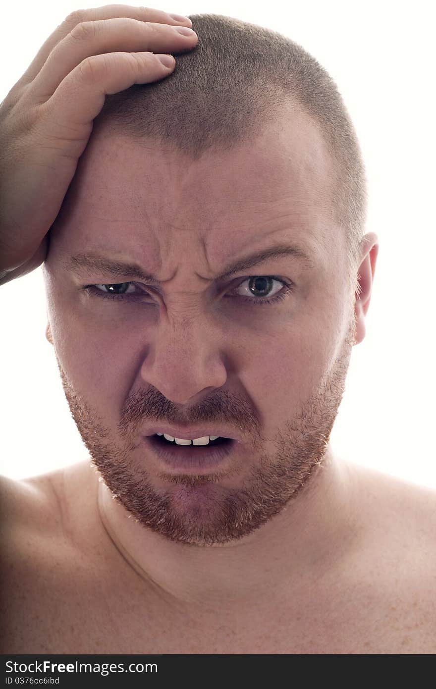 Man with hand on head on white background. Man with hand on head on white background