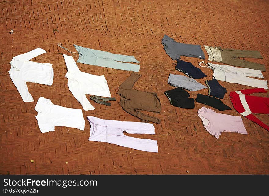 Clothes drying on the brick banks of Ganges river in Varanasi. Clothes drying on the brick banks of Ganges river in Varanasi