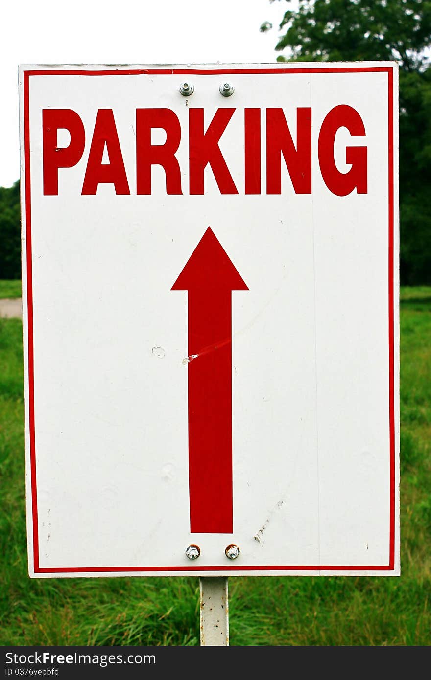 A sign indicating parking ahead