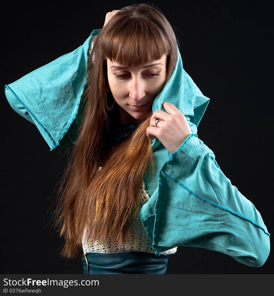 Portrait Of The Girl With Long Hair In Blue Dress