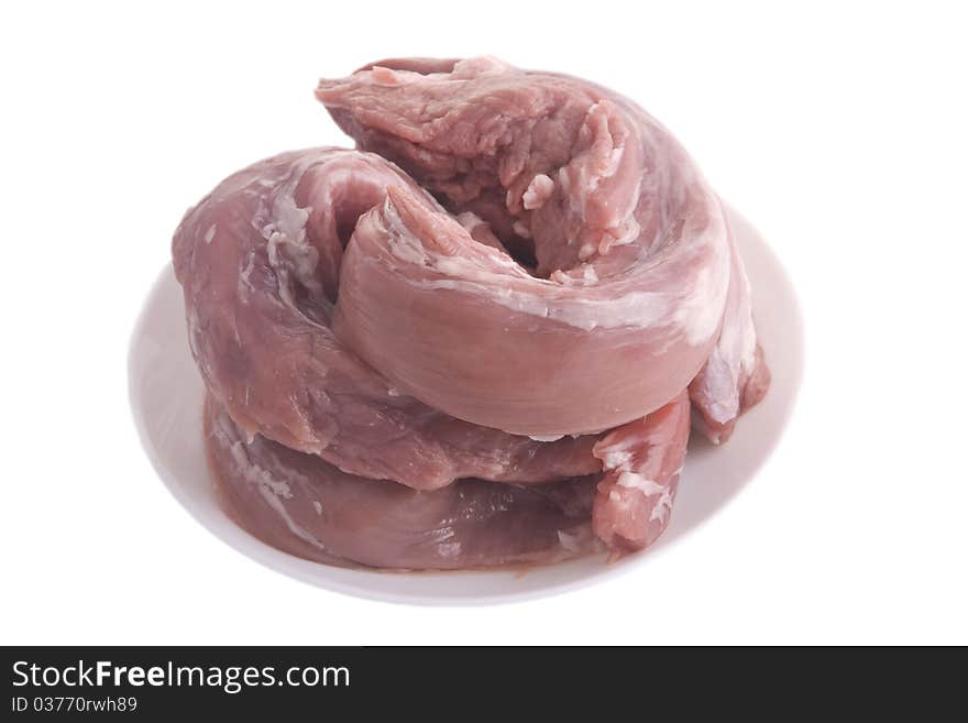 Crude meat on a plate