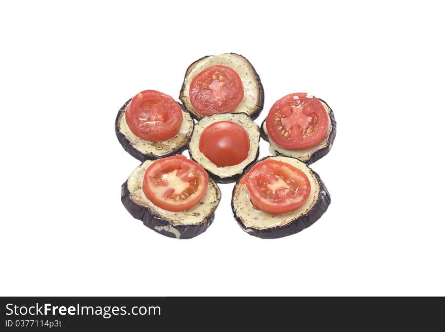 Fried eggplant with tomatoes and garlick sauce on a white background