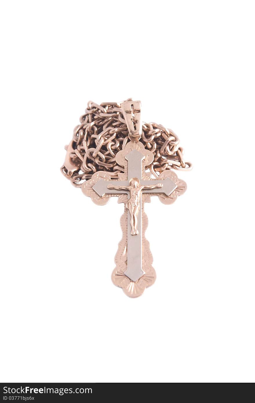 Gold cross with a chain on a white background