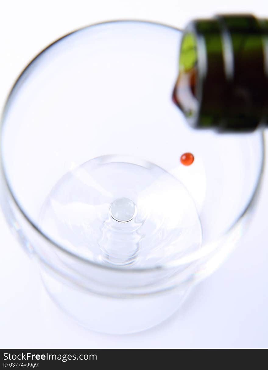 Red wine being poured into a wine glass