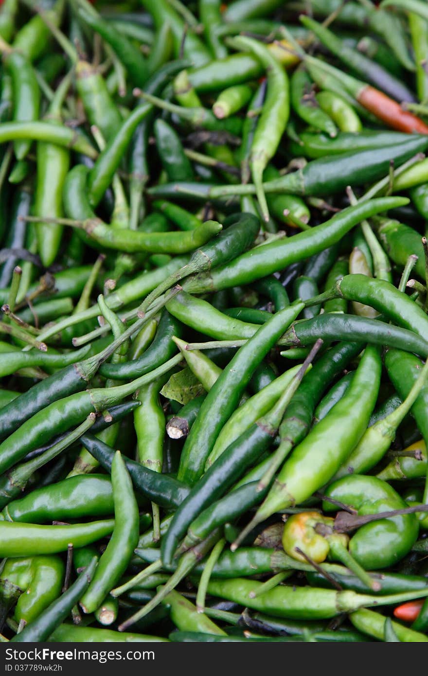 Close-up of small green chillies or cili api/padi (Malay)