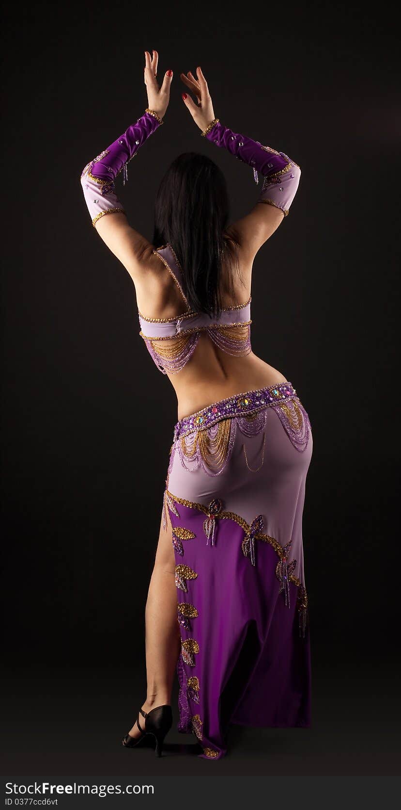 Woman Dance In Traditional Arabian Costume - Back