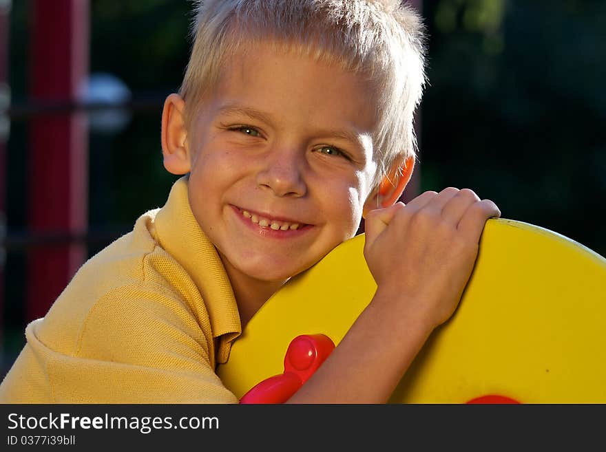 Portrait of smiling little boy - looking at camera