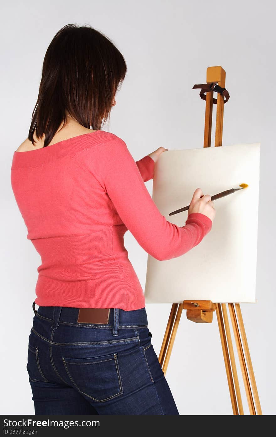 Girl Standing Near Easel And Painting