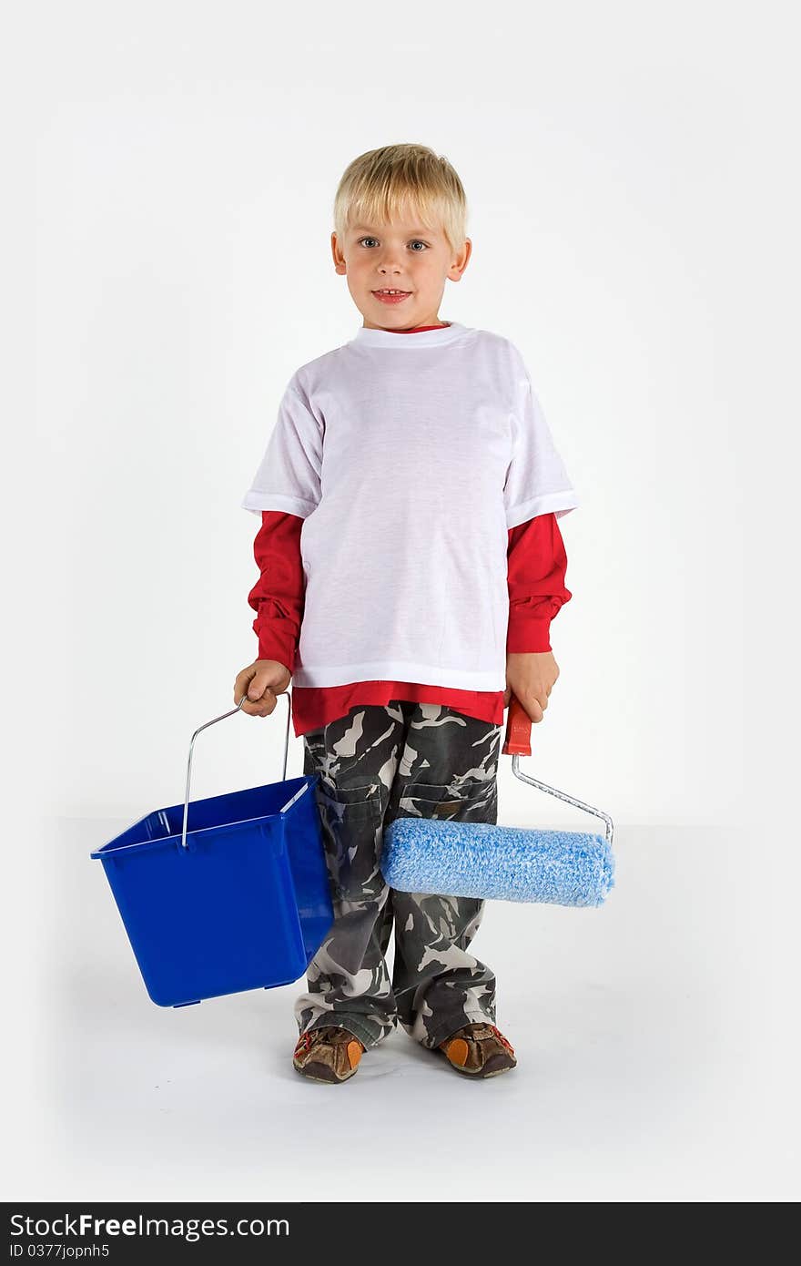 Little worker with paint roller and blue pail isolated on white