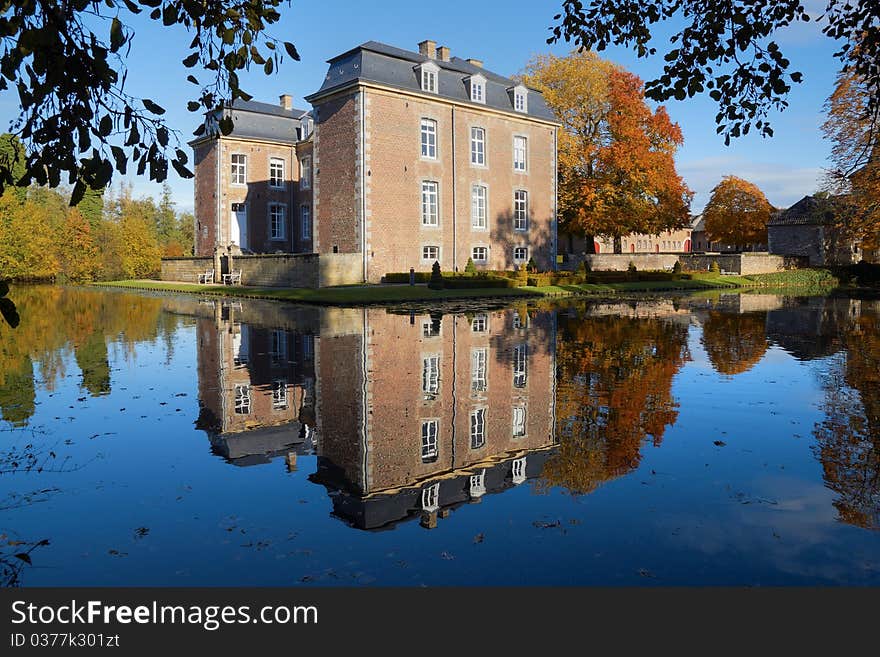 The reflection of castle cortenbach in the pond. The reflection of castle cortenbach in the pond