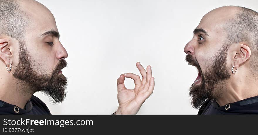 Man with beard in meditation and man yelling on white background