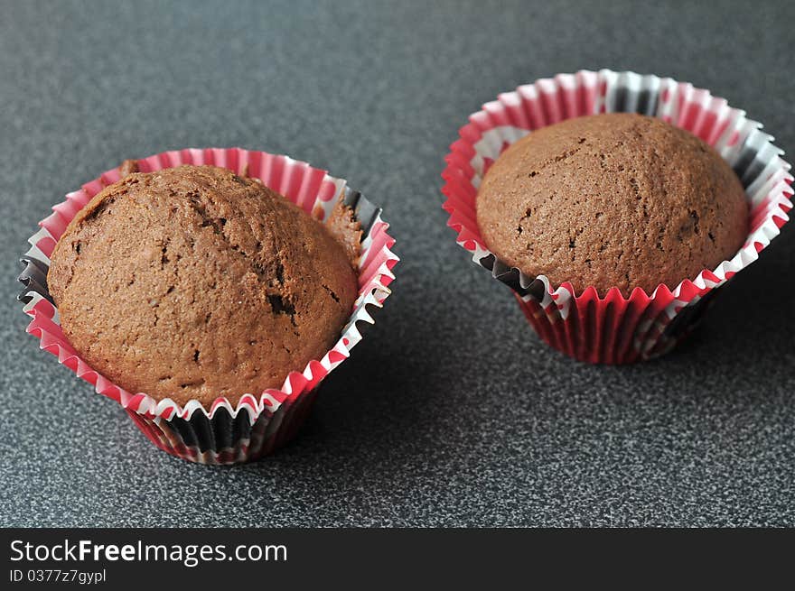 Two chocolate muffins