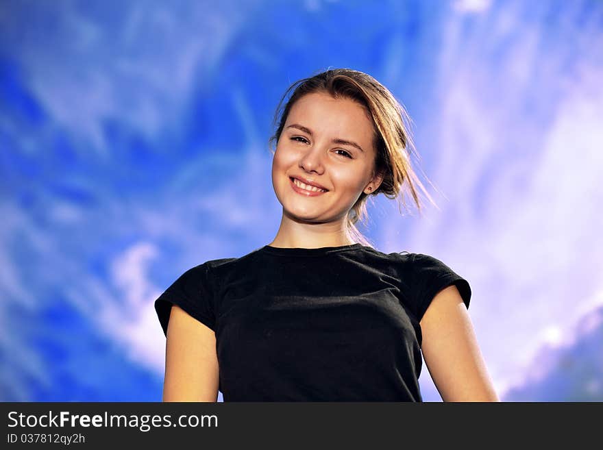 Romantic  girl with the sky over background