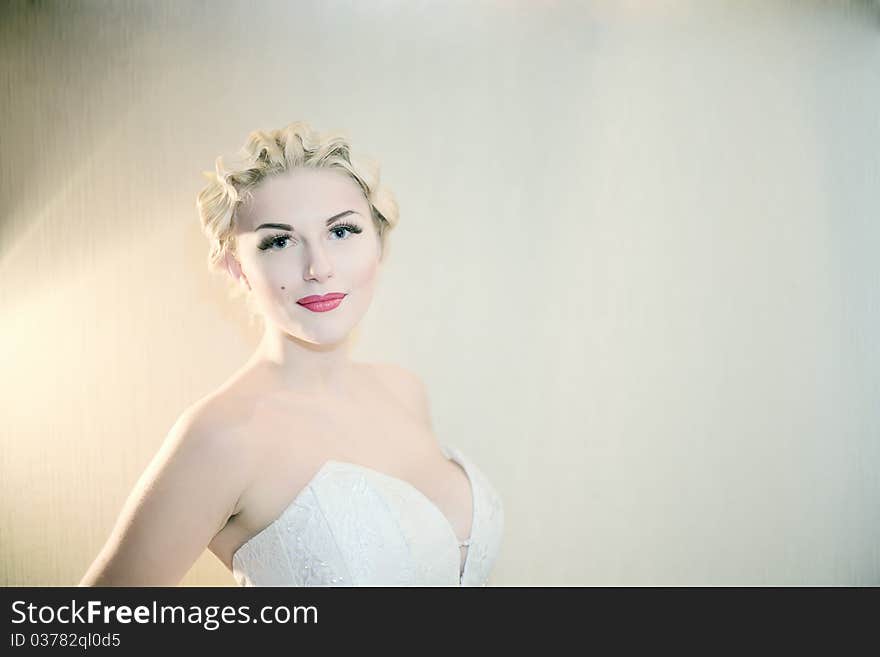 Smiling attractive girl is in white clothes