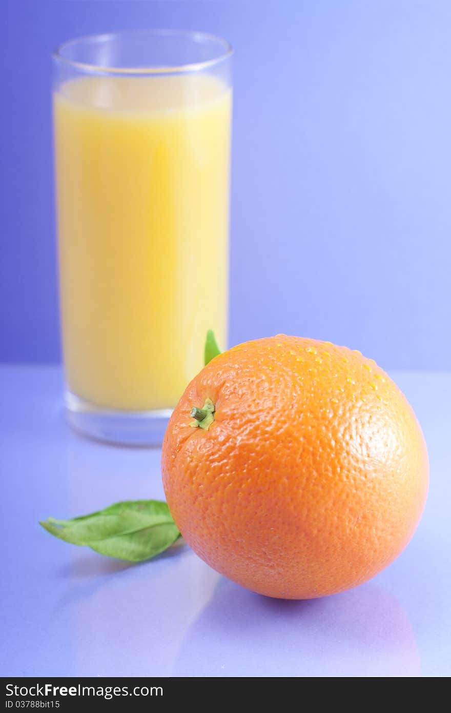 Tropical fruit and juice on blue background. Tropical fruit and juice on blue background.