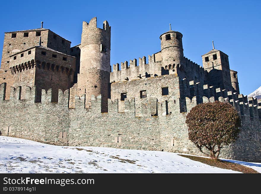 Fenis Castle is one of the most famous castles in Aosta Valley - Italy for its spectacular architecture and its many towers. Fenis Castle is one of the most famous castles in Aosta Valley - Italy for its spectacular architecture and its many towers