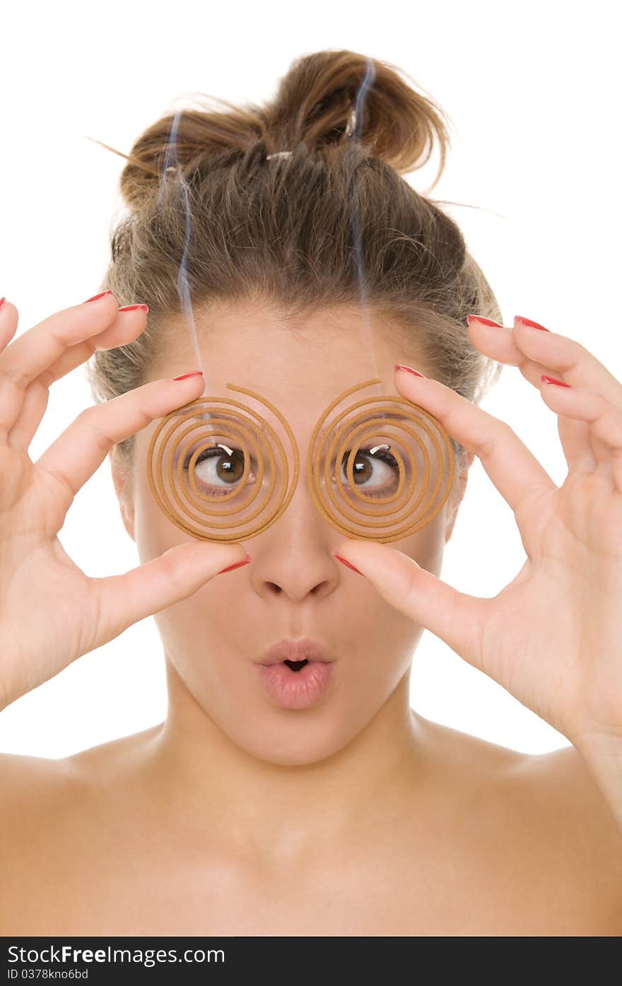 Young woman holds spiral aromas isolated in white