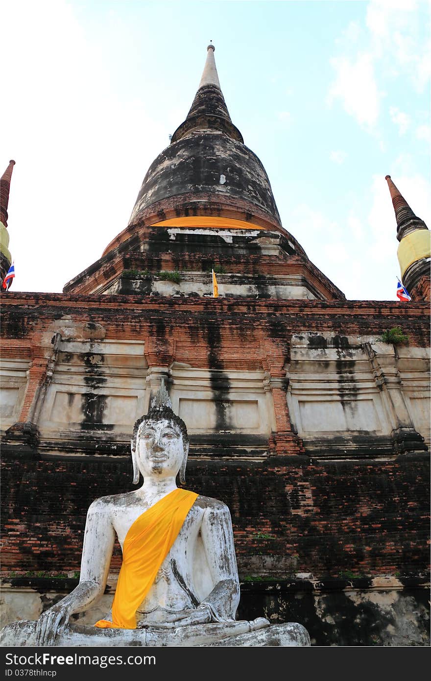 Buddha Statue With Thai Ancient City Background