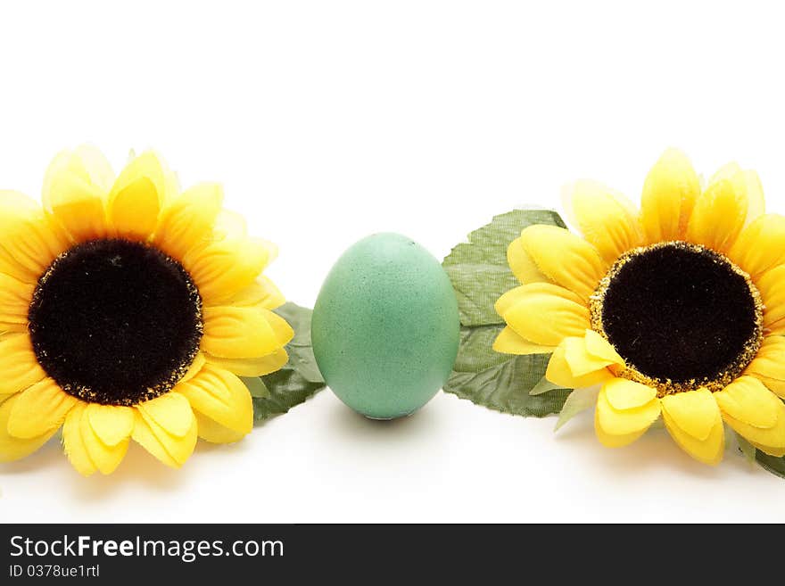 Colored egg with sunflower