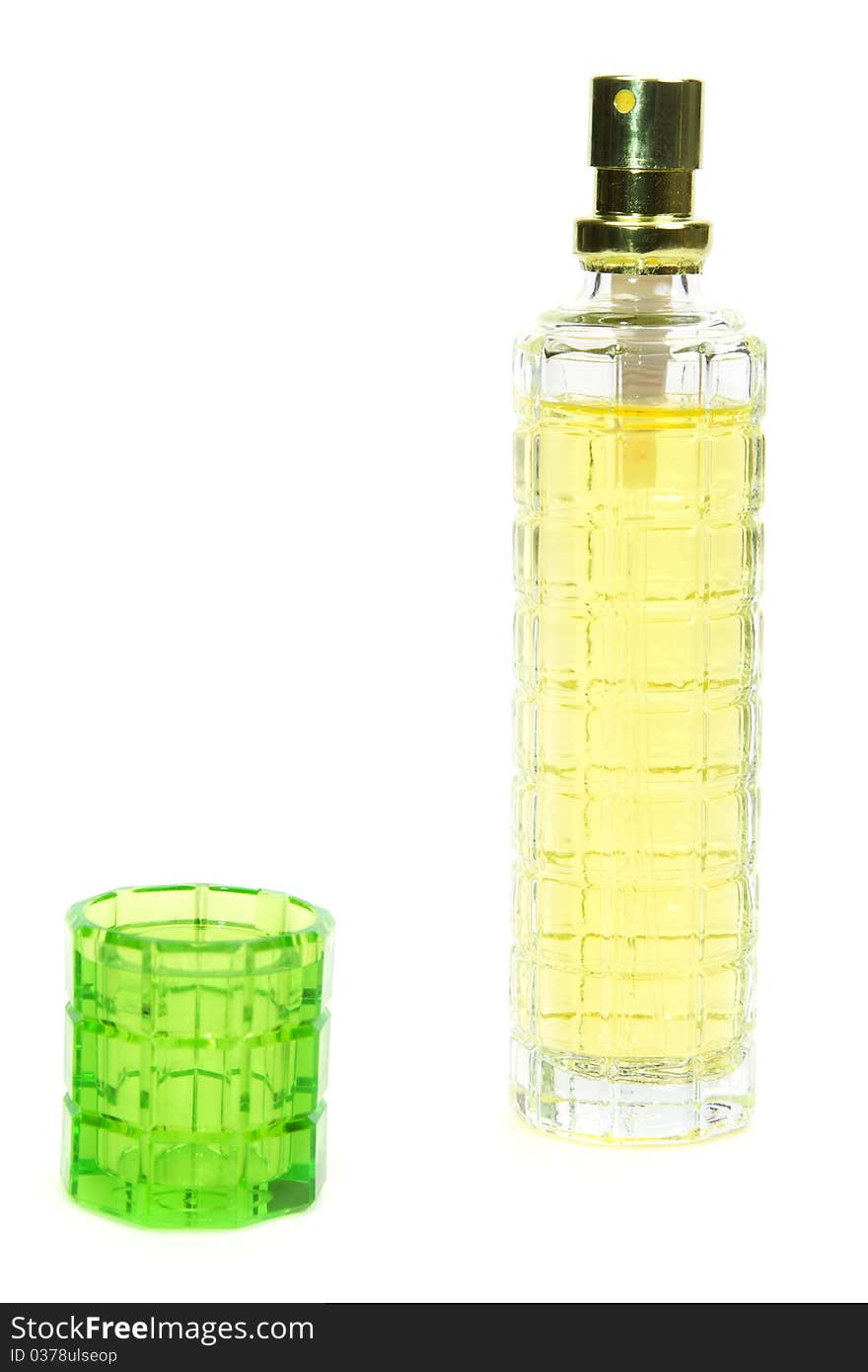 Yellow perfume bottle isolated on white background