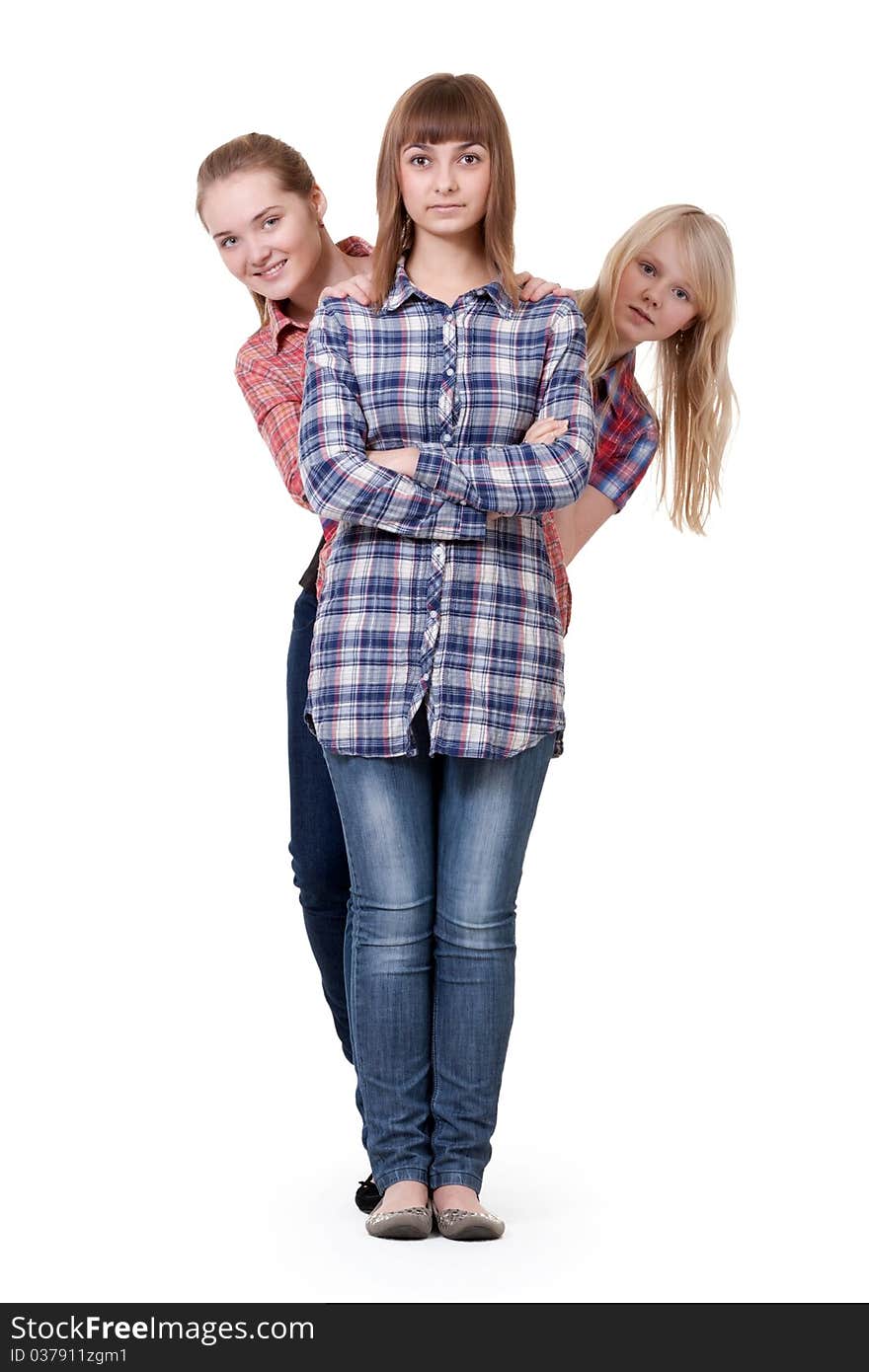 Three beautiful young women stand each other. Three beautiful young women stand each other