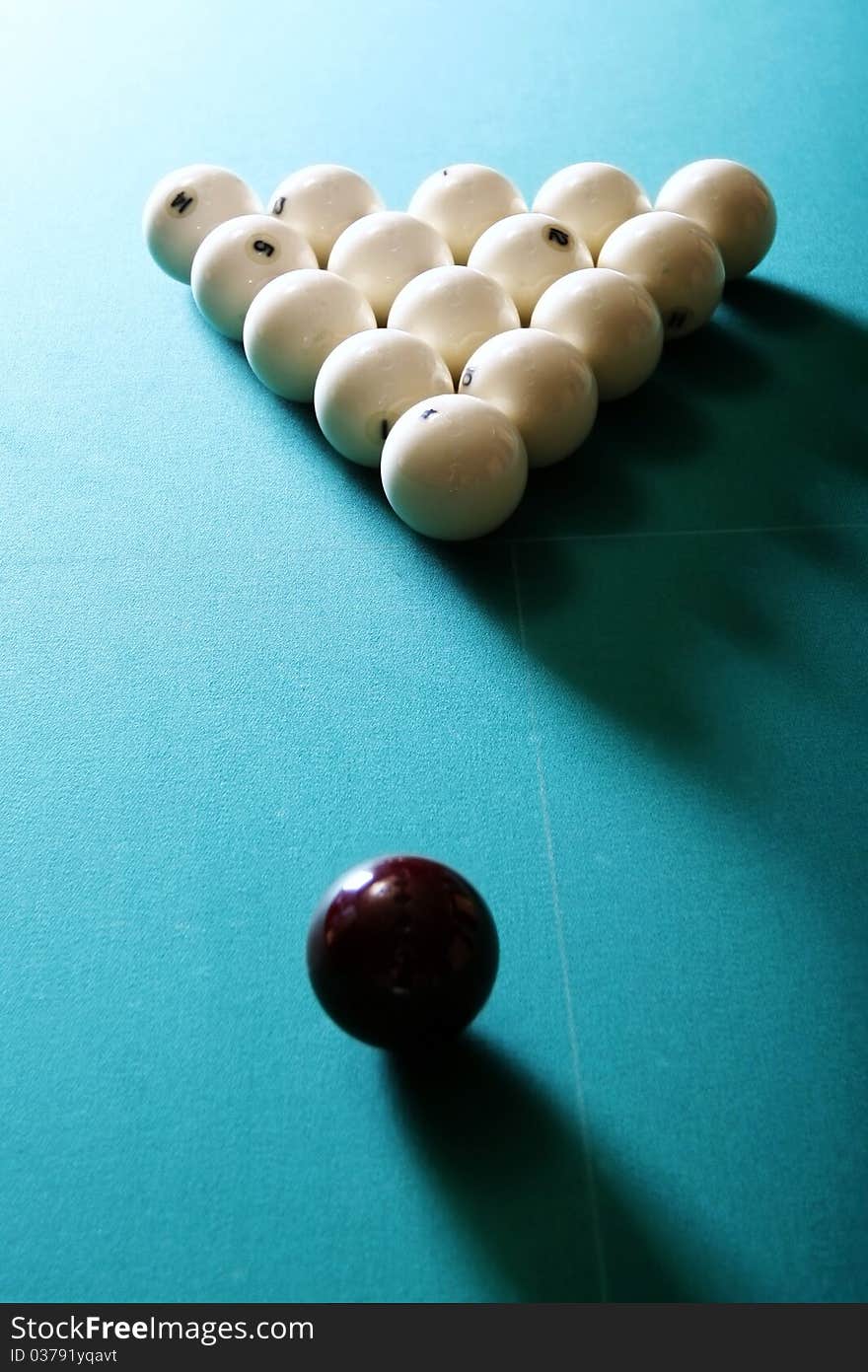 Billiards table with white balls