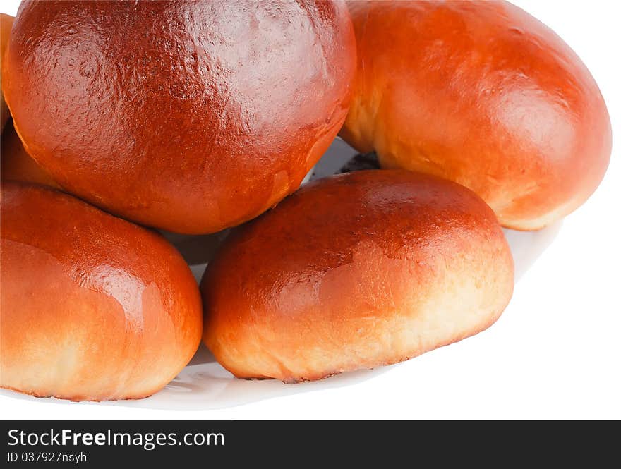 Fresh homemade buns on the plate isolated on white background (with clipping path)