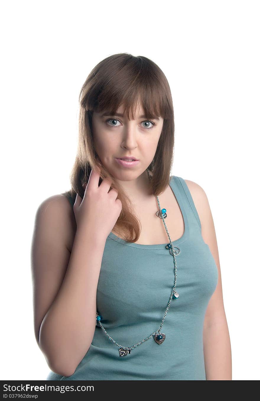 Portrait of the beautiful girl on a white background.