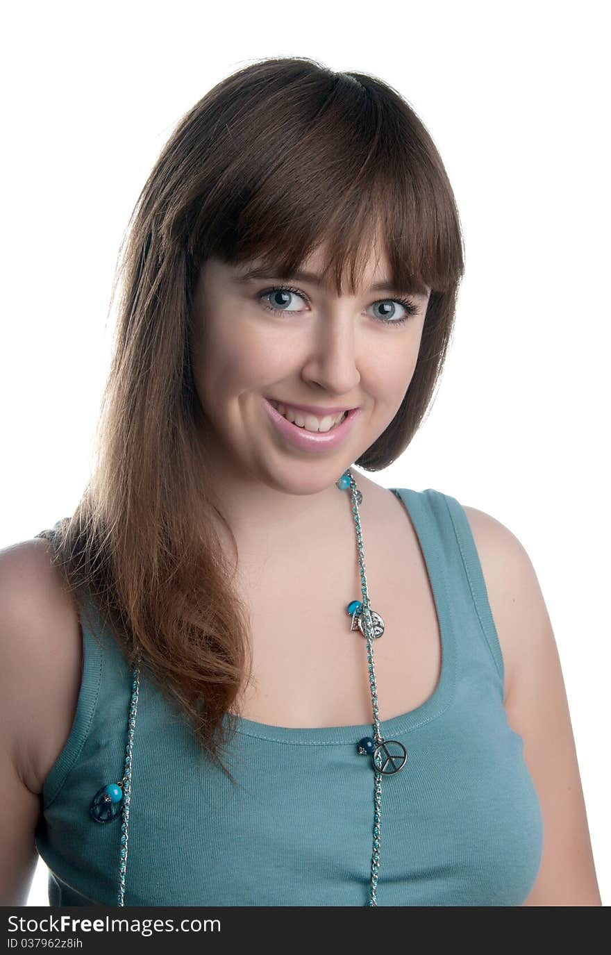 The young girl smiling on a white background