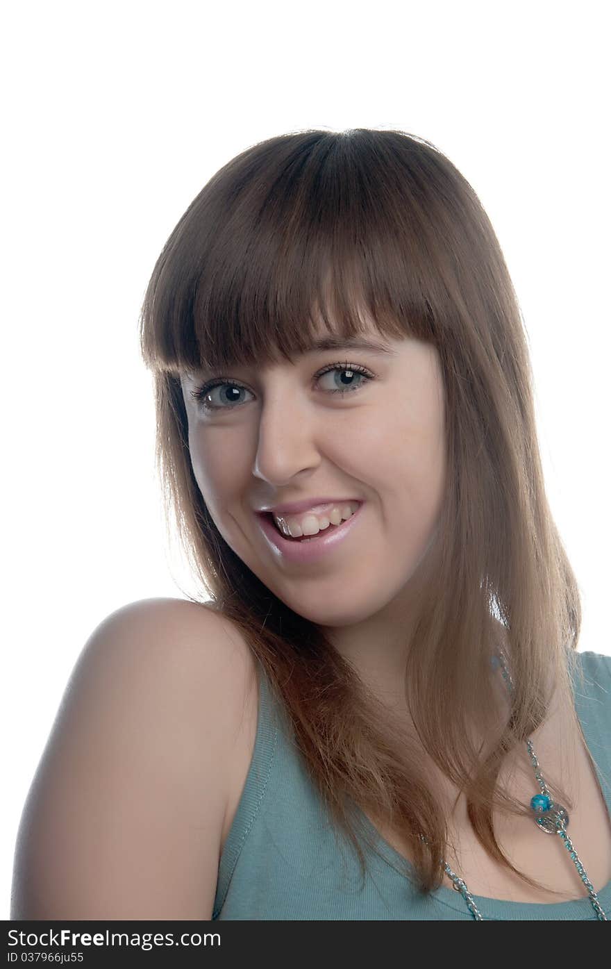 The young girl smiling on a white background