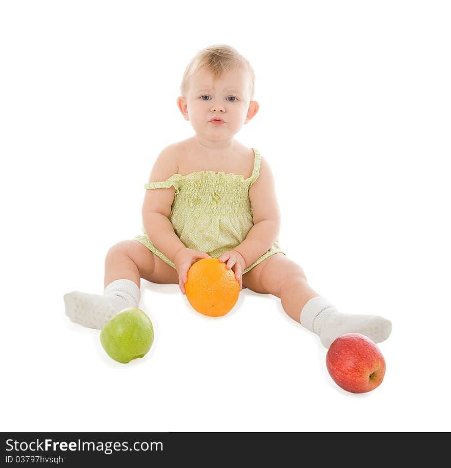 Baby with fruits isolated on white