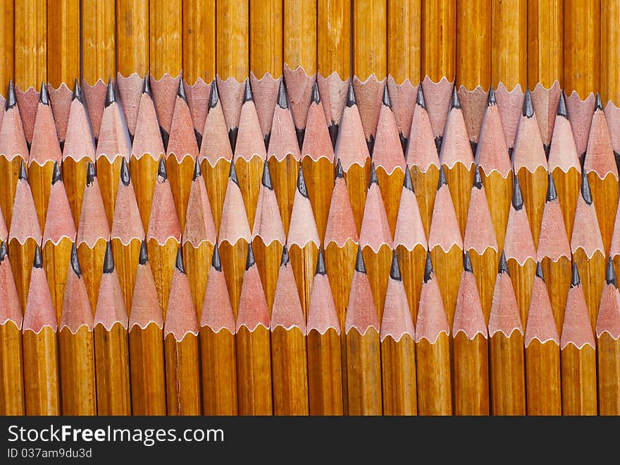 Pencils edge of each other vertically