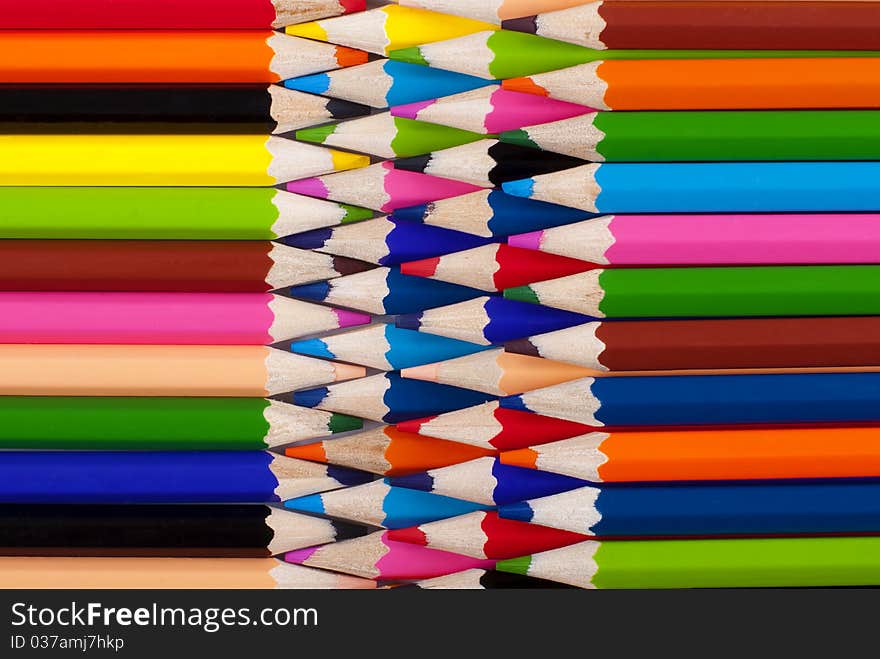 Pencils to draw stacked close to each other, horizontally, and colorful. Pencils to draw stacked close to each other, horizontally, and colorful