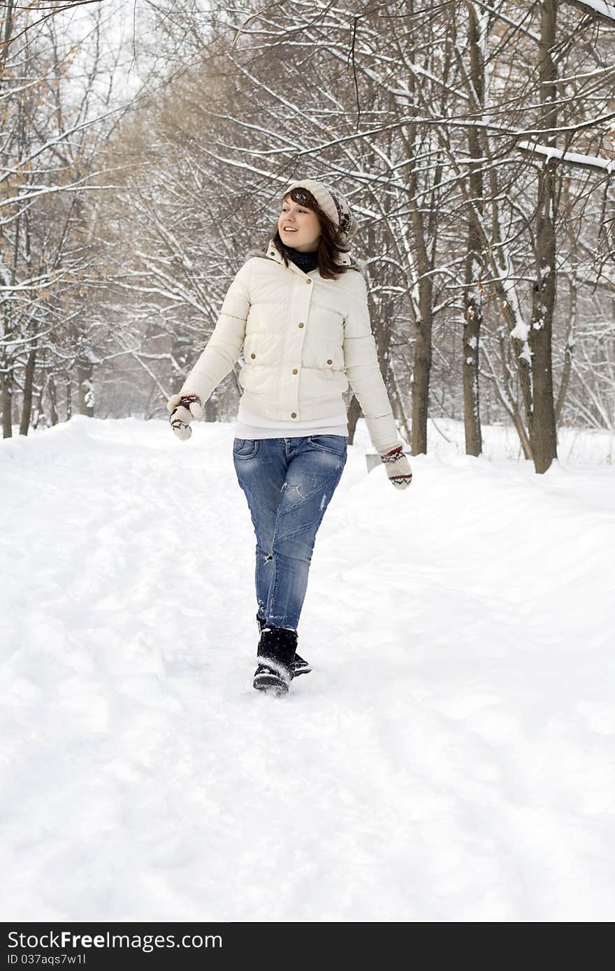 Beautiful girl walking in forest