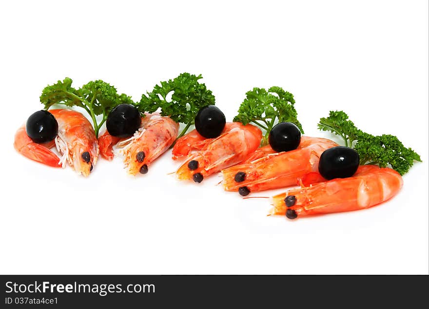 Shrimp with parsley and olives isolated on a white background