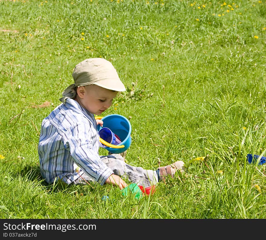 2 years old boy playing in park