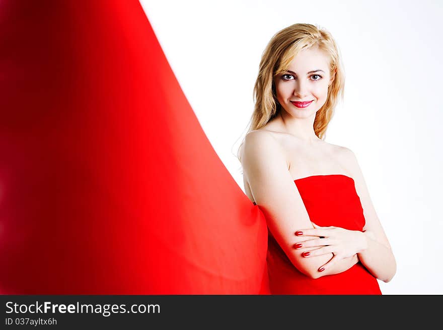 Red, beautiful blonde in a red dress