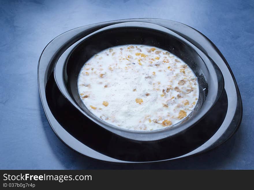 Plate of muesli with milk