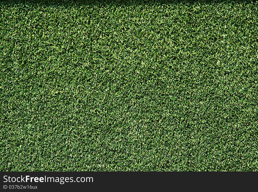 Artificial grass background close up